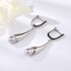 Show details for Funky Casual White Dangle Earrings
