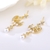 Picture of Delicate White Dangle Earrings of Original Design