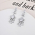 Picture of Cheap Platinum Plated White Dangle Earrings Direct from Factory