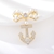 Picture of Cheap Gold Plated Delicate Brooche in Bulk