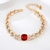 Picture of Rose Gold Plated Red Fashion Bracelet at Great Low Price
